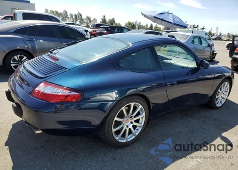 1999 Porsche 911 Carrera z USA, uszkodzony, nr VIN WP0AA2991XS623091